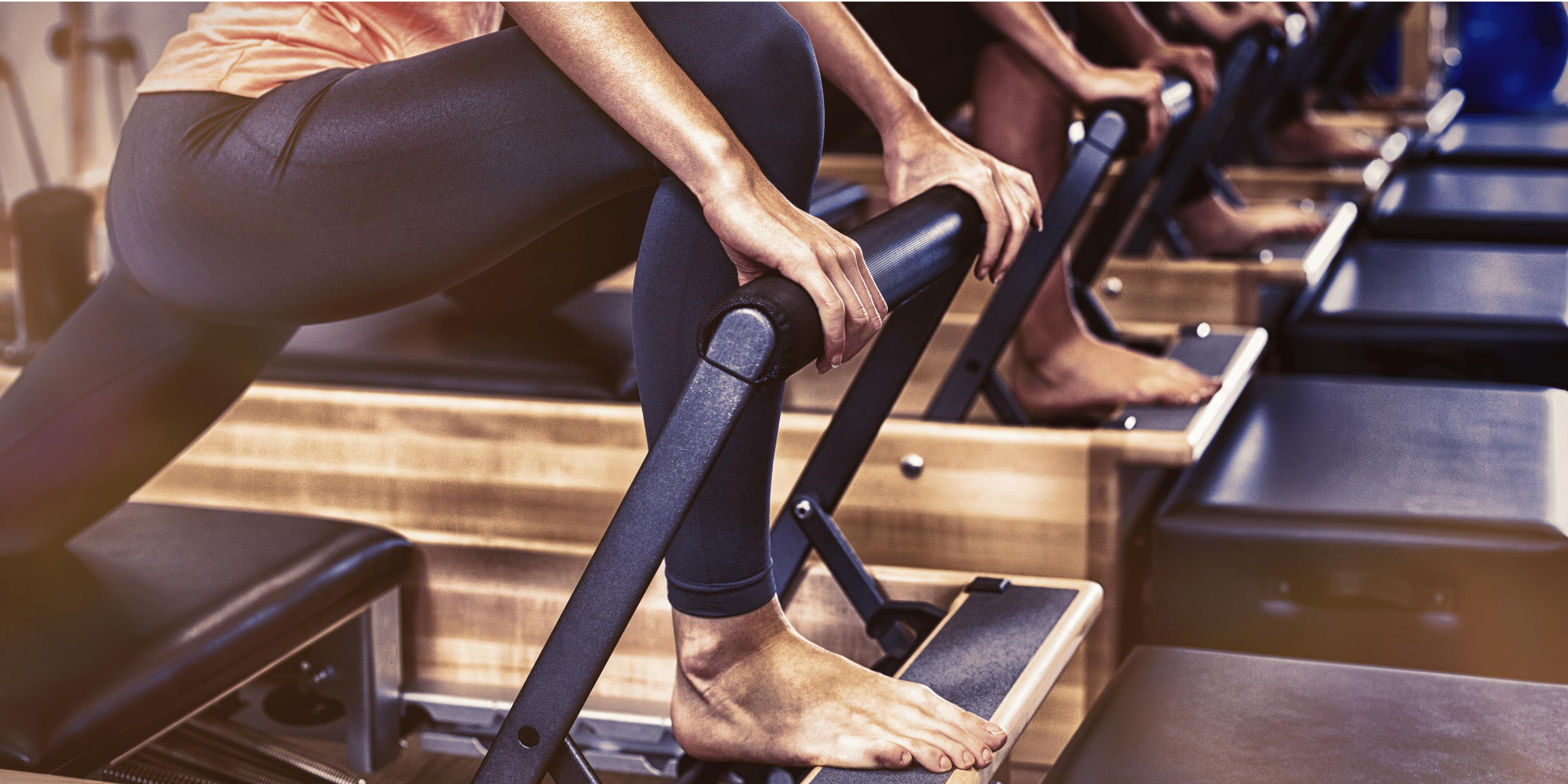 controlled core exercise on a Pilates reformer 
